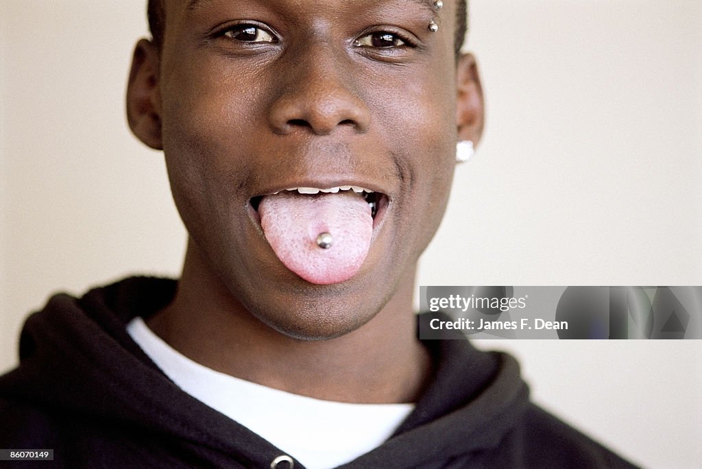 Man showing pierced tongue