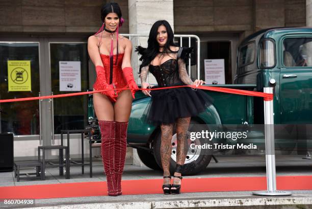 Image contains nudity.) Model Micaela Schaefer and German singer Julia Jasmin Ruehle alias JJ during the red carper Photo Call of Venus Erotic Fair...