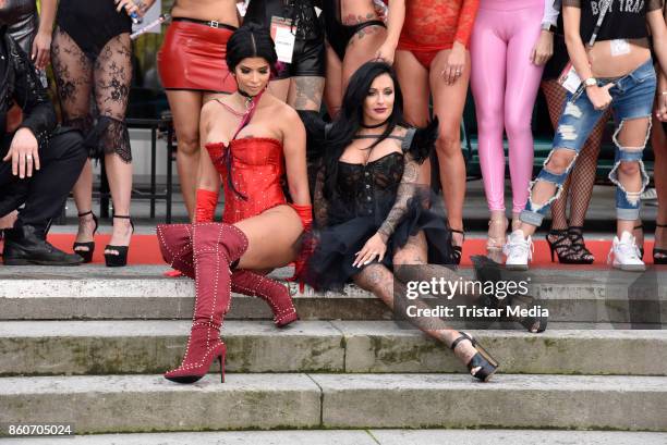 Image contains nudity.) Model Micaela Schaefer and German singer Julia Jasmin Ruehle alias JJ during the red carper Photo Call of Venus Erotic Fair...