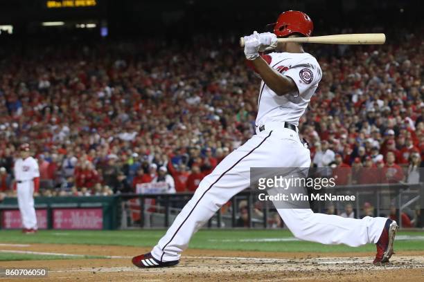 Michael A. Taylor of the Washington Nationals hits a three run home run against the Chicago Cubs during the third inning in game five of the National...
