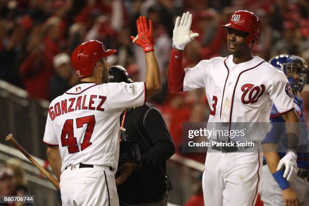 Michael A. Taylor of the Washington Nationals celebrates with Gio Gonzalez of the Washington Nationals after hitting a three run home run against the...