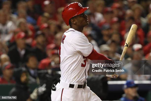 Michael A. Taylor of the Washington Nationals hits a three run home run against the Chicago Cubs during the second inning in game five of the...