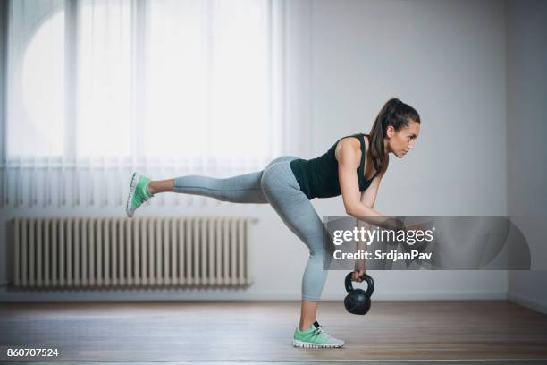 body toning - kettle bell stock pictures, royalty-free photos & images