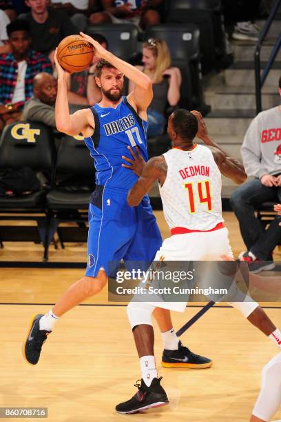 Jeff Withey of the Dallas Mavericks handles the ball against the Atlanta Hawks on October 12, 2017 at McCamish Pavilion in Atlanta, Georgia. NOTE TO...