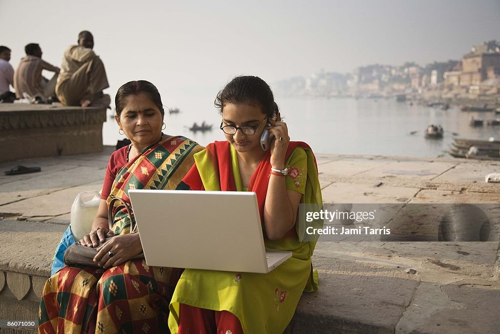 Women in India on laptop computer