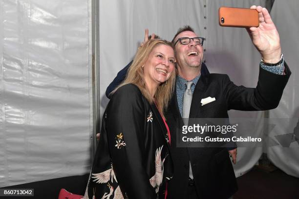 Chef Amanda Freitag and Chopped host Ted Allen take a selfie at The Food Network & Cooking Channel New York City Wine & Food Festival Presented By...
