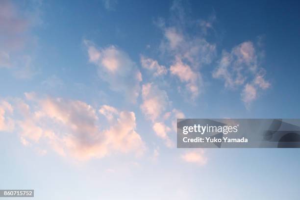 clouds typologies - cloudscape during sunset - cloud typologies stock-fotos und bilder