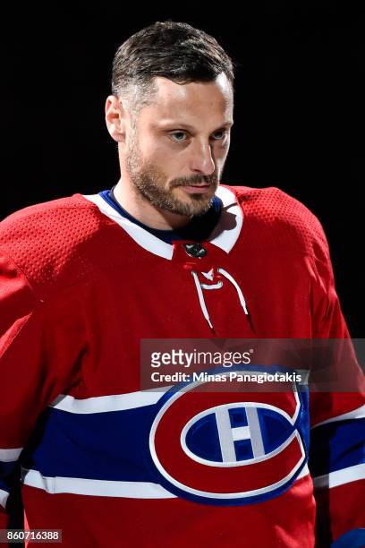 Mark Streit of the Montreal Canadiens takes to the ice during the pre game ceremony prior to the NHL game against the Chicago Blackhawks at the Bell...