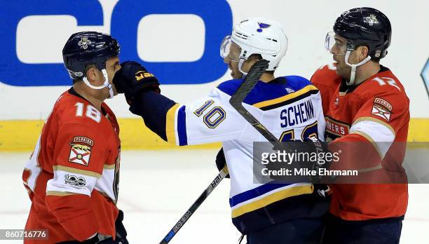 Micheal Haley of the Florida Panthers and Brayden Schenn of the St. Louis Blues fight during a game at BB&T Center on October 12, 2017 in Sunrise,...