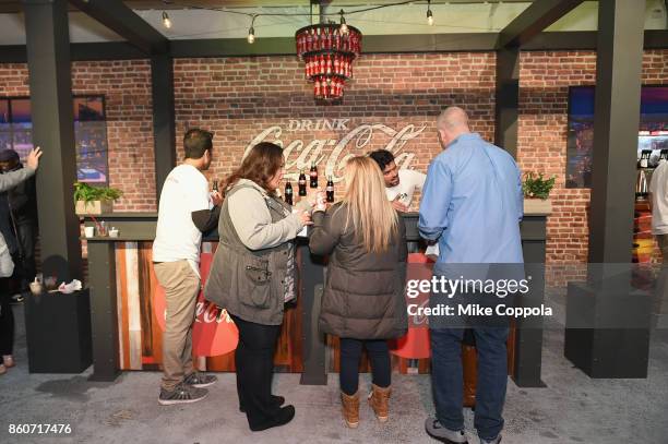 Guests enjoy Coca-Cola at The Food Network & Cooking Channel New York City Wine & Food Festival Presented By Coca-Cola - Smorgasburg presented by...