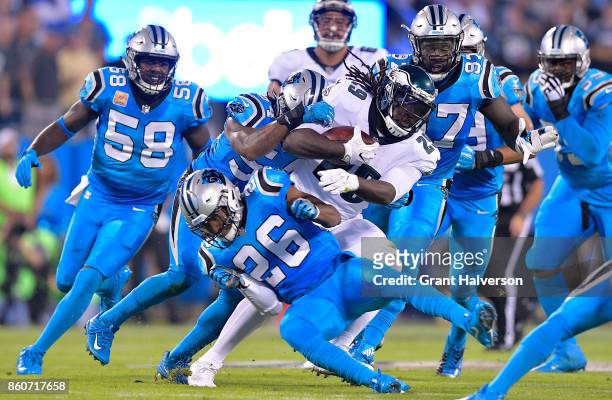 LeGarrette Blount of the Philadelphia Eagles runs the ball against Daryl Worley of the Carolina Panthers in the first quarter during their game at...