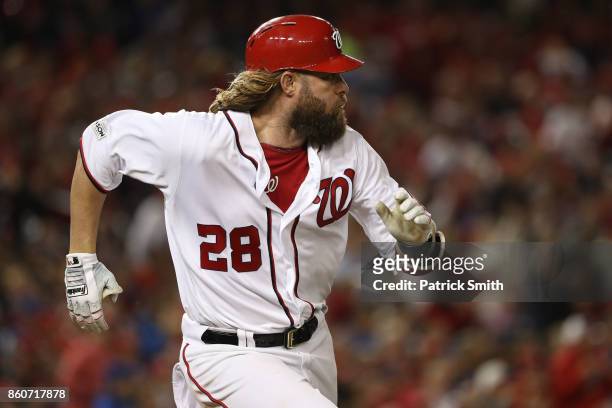 Jayson Werth of the Washington Nationals runs after hitting a single against the Chicago Cubs during the fourth inning in game five of the National...