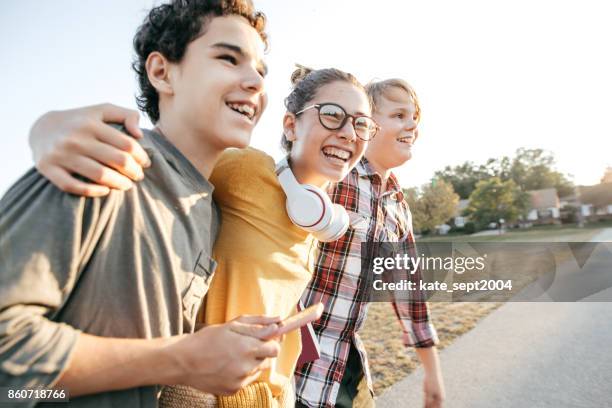 friends having fun after school - girl headphones imagens e fotografias de stock