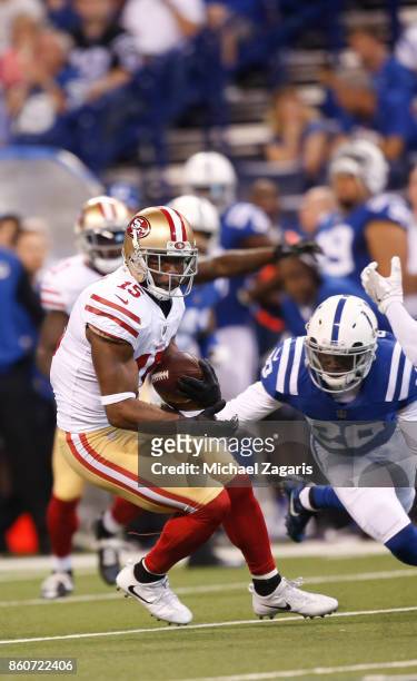 Pierre Garcon of the San Francisco 49ers runs after making a reception during the game against the Indianapolis Colts at Lucas Oil Stadium on October...