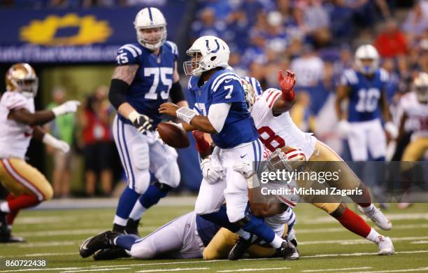 DeForest Buckner and Elvis Dumervil of the San Francisco 49ers sack Jacoby Brissett of the Indianapolis Colts during the game at Lucas Oil Stadium on...