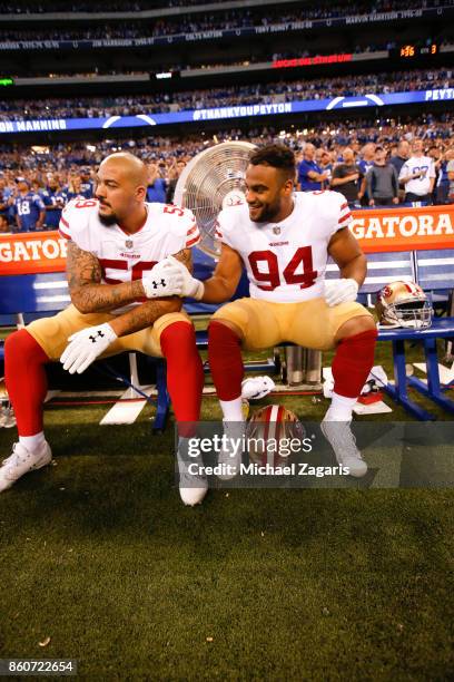 Aaron Lynch and Solomon Thomas of the San Francisco 49ers sit on the bench during the game against the Indianapolis Colts at Lucas Oil Stadium on...