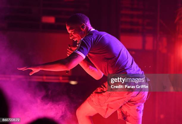 Recording artist Kid Cudi perform in concert during "Passion, Pain & Demon Slayin' World Tour" at Coca Cola Roxy on October 12, 2017 in Atlanta,...