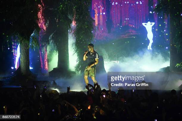 Recording artist Kid Cudi perform in concert during "Passion, Pain & Demon Slayin' World Tour" at Coca Cola Roxy on October 12, 2017 in Atlanta,...