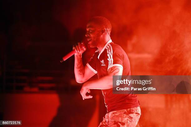 Recording artist Kid Cudi perform in concert during "Passion, Pain & Demon Slayin' World Tour" at Coca Cola Roxy on October 12, 2017 in Atlanta,...