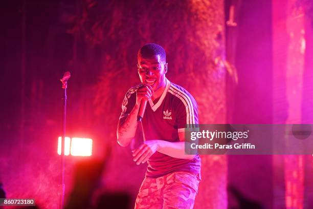 Recording artist Kid Cudi perform in concert during "Passion, Pain & Demon Slayin' World Tour" at Coca Cola Roxy on October 12, 2017 in Atlanta,...