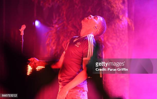 Recording artist Kid Cudi perform in concert during "Passion, Pain & Demon Slayin' World Tour" at Coca Cola Roxy on October 12, 2017 in Atlanta,...