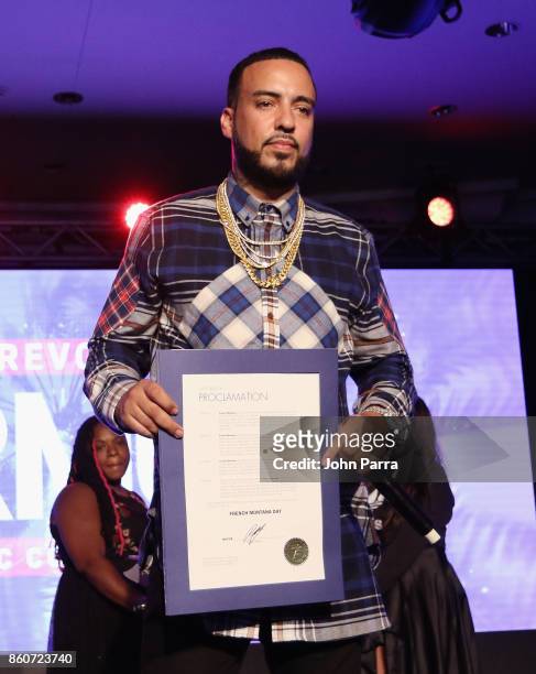 French Montana accepts his proclamation on stage at the 2017 REVOLT Music Conference - Chairman's Welcome Ceremony at Eden Roc Hotel on October 12,...