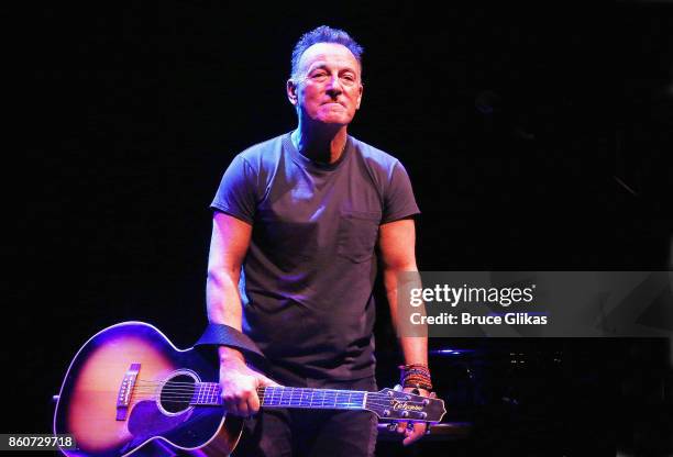 Bruce Springsteen takes his opening night bow in "Springsteen on Broadway" on Broadway at The Walter Kerr Theatre on October 12, 2017 in New York...