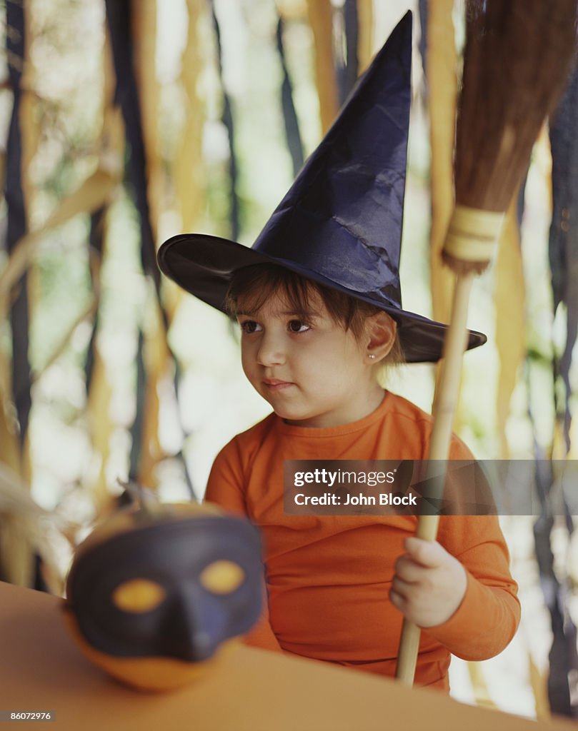 Girl dressed as witch for Halloween