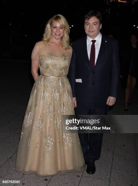 Actor Mike Myers and Kelly Tisdale are seen on October 12, 2017 in New York City.