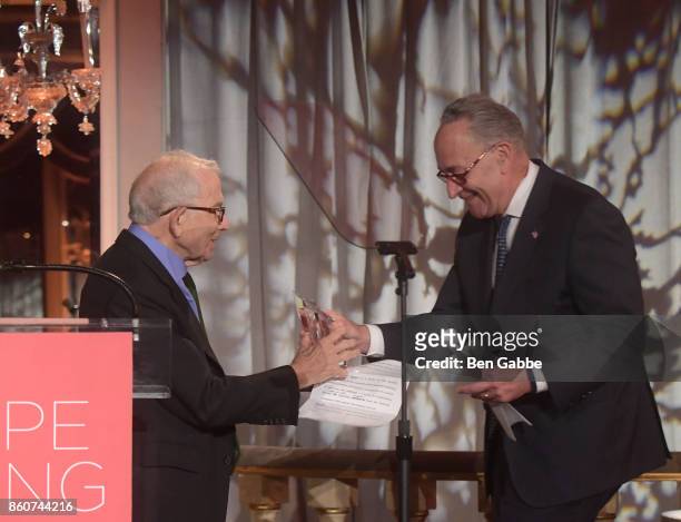 Owner, Advance Publications Donald Newhouse presents an award to Sen. Charles E. Schumer on stage during The Association for Frontotemporal...