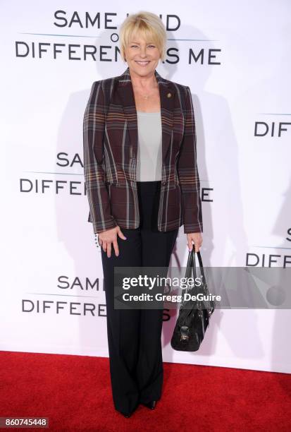Judi Evans arrives at the premiere of Paramount Pictures and Pure Flix Entertainment's "Same Kind Of Different As Me" at Westwood Village Theatre on...