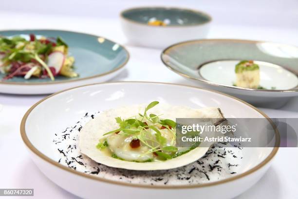 Diver scallop crudo created by chef Emily Yuen is served during the Alain Ducasse celebration of women in the kitchen part of the Bank of America...