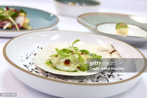 Diver scallop crudo created by chef Emily Yuen is served during the Alain Ducasse celebration of women in the kitchen part of the Bank of America...