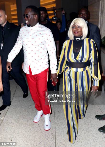 Sean "Diddy" Combs and Janice Combs arrive at the 2017 REVOLT Music Conference - Chairman's Welcome Ceremony at Eden Roc Hotel on October 12, 2017 in...