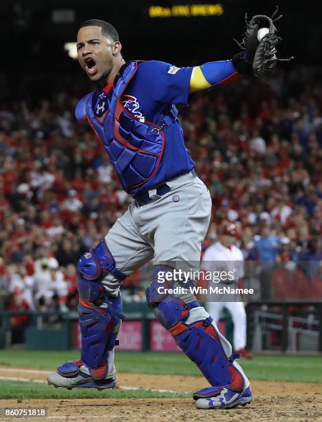 Willson Contreras of the Chicago Cubs celebrates after the final out of Game 5 of the National League Divisional Series at Nationals Park on October...