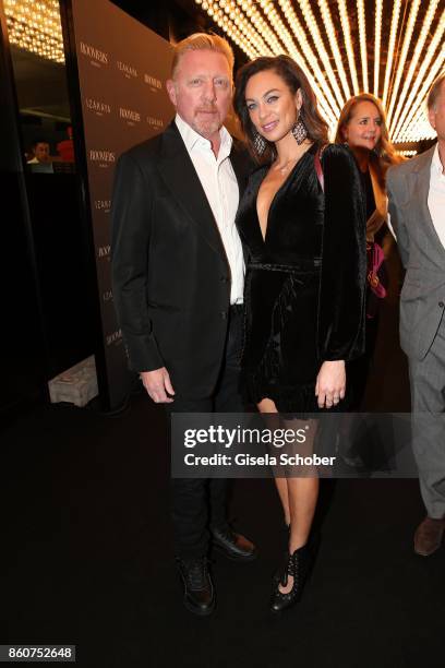 Boris Becker and his wife Lilly Becker during the grand opening of Roomers & IZAKAYA on October 12, 2017 in Munich, Germany.