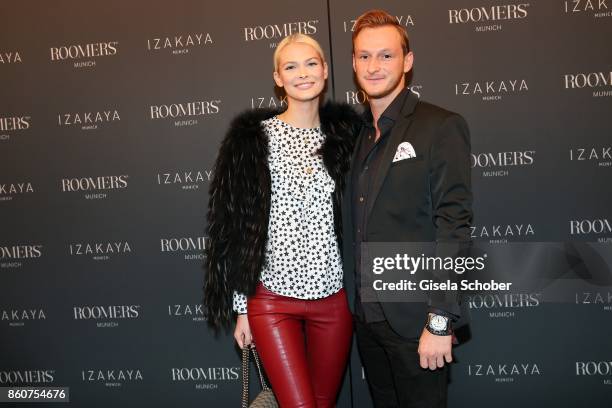 Darya Strelnikova and her boyfriend Roger Steininger during the grand opening of Roomers & IZAKAYA on October 12, 2017 in Munich, Germany.