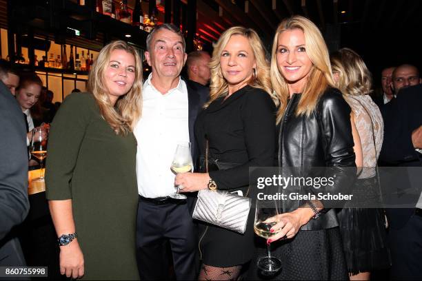 Wolfgang Niersbach and his girlfriend Marion Popp Birgit Fischer-Hoeper and Sandra Abt during the grand opening of Roomers & IZAKAYA on October 12,...