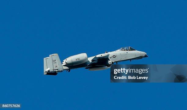 An A-10 from the 47th Fighter Squadron flies over before the game at Kyle Field on October 7, 2017 in College Station, Texas.