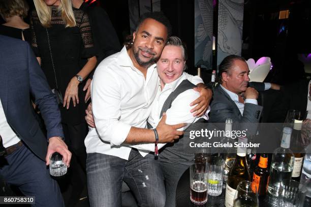 Soccer player Patrick Owomoyela and Franjo Pooth during the grand opening of Roomers & IZAKAYA on October 12, 2017 in Munich, Germany.