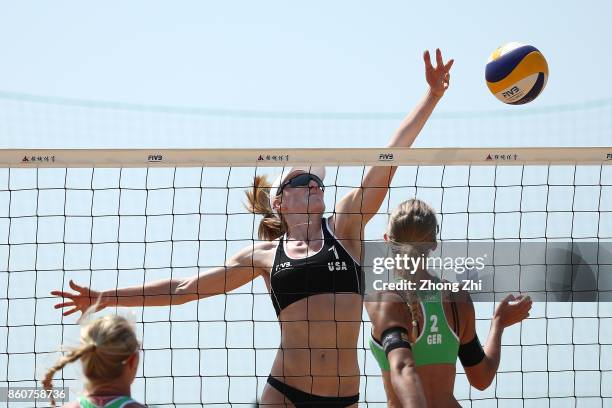 Emily Day of the United States in action with Brittany Hochevar of the United States during the match against Kim Behrens and Sandra Ittlinger of...