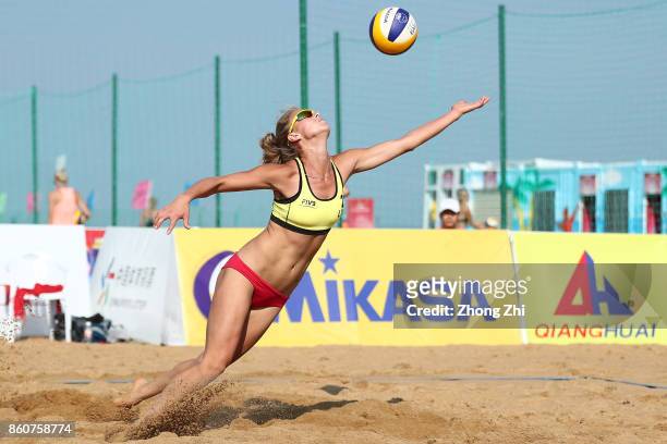 Monika Povilaityte of Lithuania in action with Ieva Dumbauskaite of Lithuania during the match against Mariafe Artacho and Taliqua Clancy of...