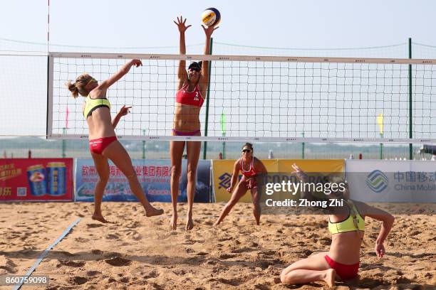 Mariafe Artacho of Australia in action with Taliqua Clancy of Australia during the match against Ieva Dumbauskaite and Monika Povilaityte of...