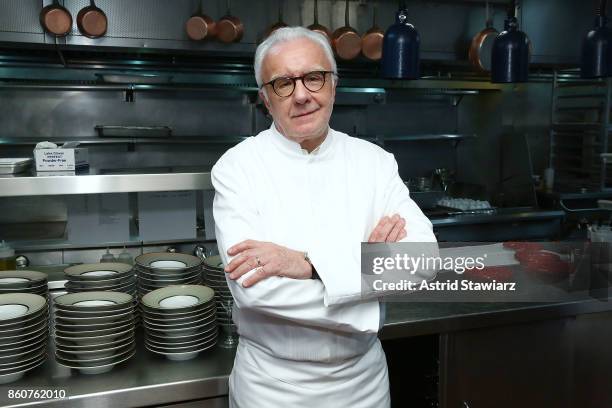 Chef Alain Ducasse poses for photos during the celebration of women in the kitchen part of the Bank of America Dinner Series presented by The Wall...