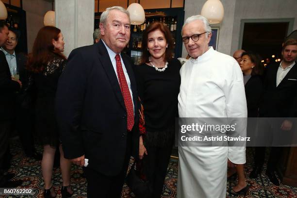 Chef Alain Ducasse poses for photos with guests during the celebration of women in the kitchen part of the Bank of America Dinner Series presented by...