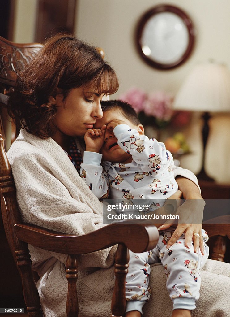 Mother comforting child