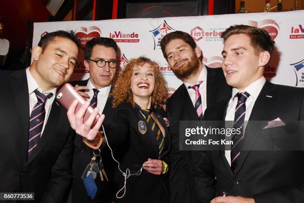 Veronique Langlais Presidente syndicat Federation de la Boucherie , rugbyman Pascal Pape and members of the Stade de France attend the 'Boeuf A la...