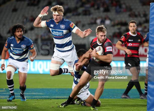 Braydon Ennor of Canterbury heads in to score a try with Blake Gibson of Auckland in defence during the round nine Mitre 10 Cup match between...