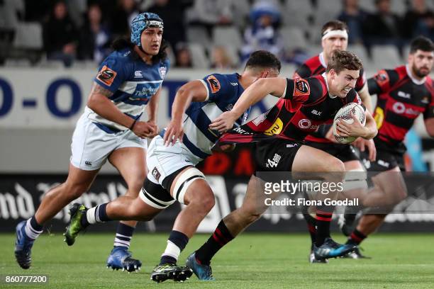 Josh McKay of Canterbury is tackled by Samuel Slade of Auckland during the round nine Mitre 10 Cup match between Auckland and Canterbury at Eden Park...