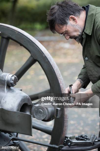 Phil Talbot, a gunsmith for John Slough, works on a field gun. Mr Slough, a world-renowned historical gunsmith, who specialises in re-conditioning...